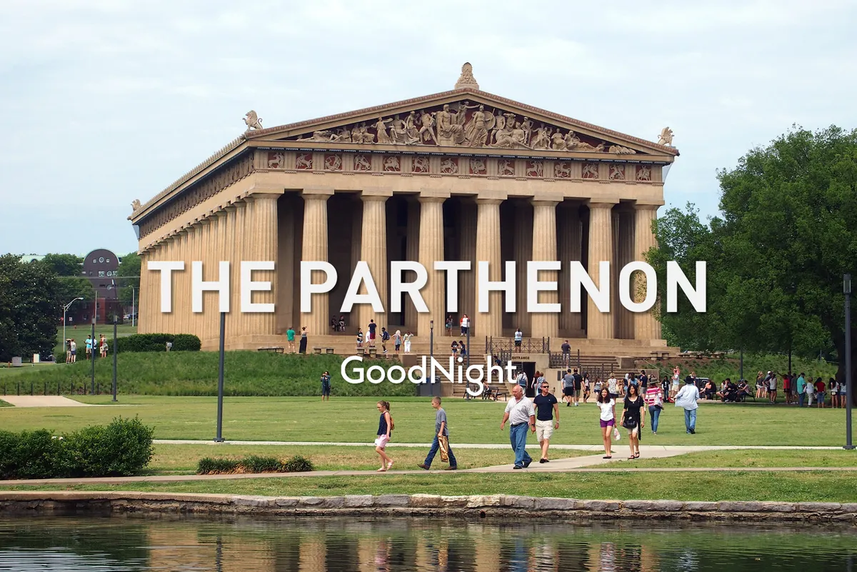 This image shows the iconic Parthenon structure in Nashville, with people strolling across a lush green lawn under a bright sky. The presence of families and groups highlights the landmark's popularity as a gathering spot for sightseeing, photography, and picnicking.
